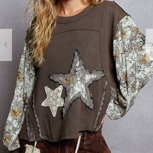 112.Round neck balloon sleeve roomy fit Top in thermal with patch detail